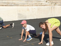 Emma, Natan, Libby & Callum do the superhero Tri
