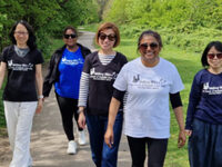 WALKING MILES FOR REYNALDS CROSS SMILES
